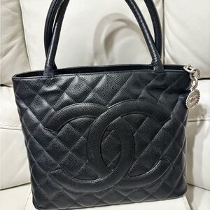 CHANEL Black Medallion Quilted Tote with Silver Charm